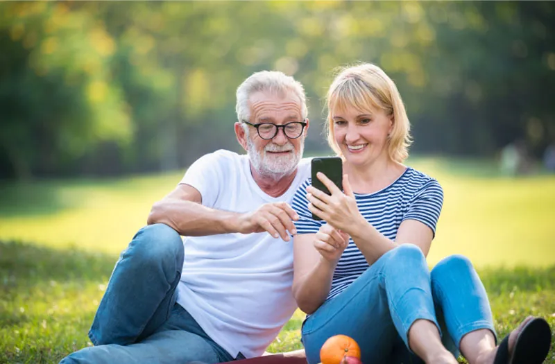 Couple looking at a phone together