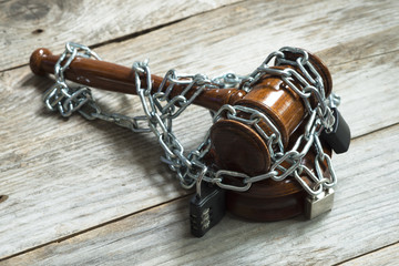 gavel wrapped in chains
