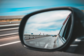 highway in rearview mirror