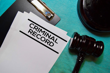 gavel and clipboard that says criminal record